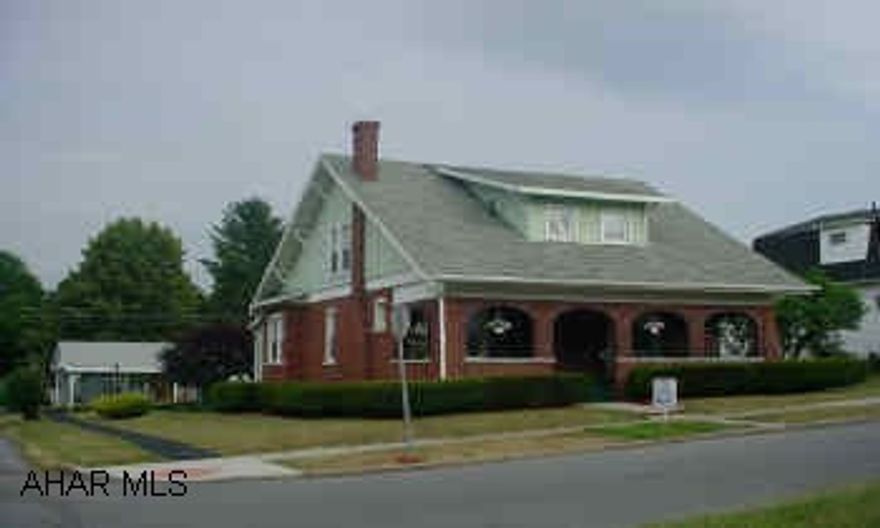 One of a kind!  Meticulous East End brick home with leaded and stained glass windows, original woodwork, and so much more.  See interior pics.
