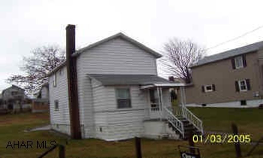 Two story aluminum sided 2 bedroom well maintained home on corner lot.