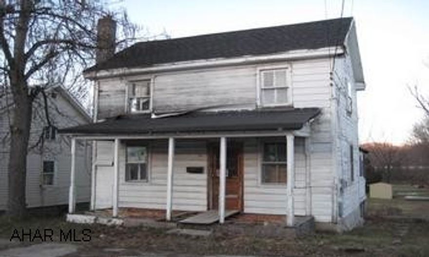 Public water and sewer available.  Shelled out house to fix up as you wish or tear down to build what you like. This property is located close to the fairgrounds and downtown Bedford.  The house has been shelled out for renovations or you could just tear down the current home and start anew.  Tough to find a lot in the Borough for this price!!!!