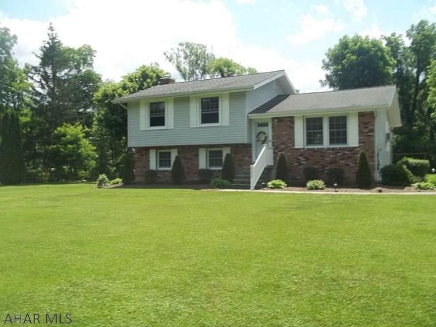 A must see!  A super well kept 3 bedroom home on almost an acre of land.  This property is conveniently located to shopping, yet feels like you have country living.  This home is in mint condition from top to bottom. The family room has a gorgeous bar for entertaining.  If you want to relax, you can enjoy the spacious deck and patio outside.  Perfect location, great landscaping, and huge lot.  This property has it all!  Schedule your showing today.