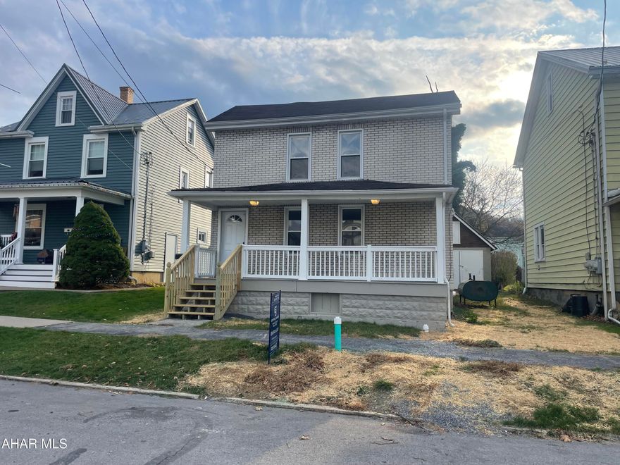 NEW ROOF!!!! Super cute 2 bedroom 1 bath home in Williamsburg Borough. White brick veneer exterior with large front porch.  Spacious living area. Modern Kitchen. Mud/Laundry room.  Sitting area with the 2 bedrooms upstairs. Garage/worekshop. 37 x 175 lot. Come take a look!