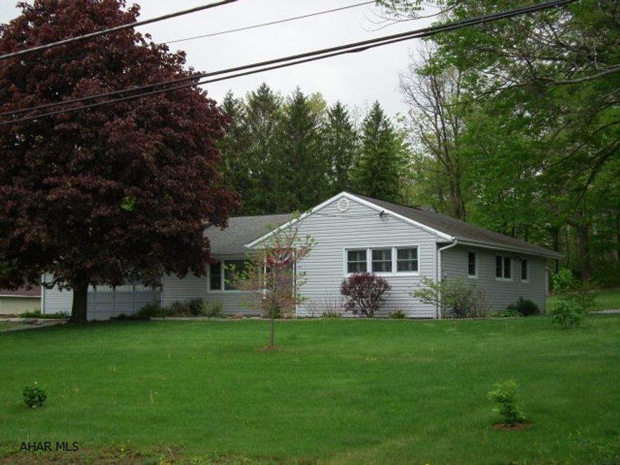 Tired of your 2 story? Thinking about the future? Now is the time to make a change. Move into this 1-story home with partially finished full basement, 3 bedroom, 2 full baths and hardwood floors. All on .902 acre! Act now while interest rates are good!