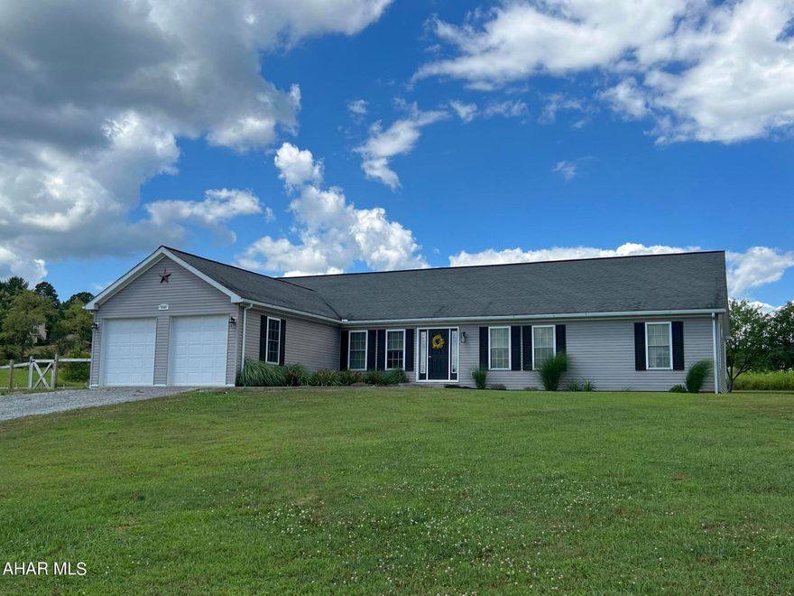 Ease of one-story living with beautiful country views in Warriors Mark. This spacious 3 bedroom ranch sits on 2.07 peaceful acres at the end of a private lane. Open concept kitchen with granite countertops and all new appliances plus great room area with fireplace is ideal for entertaining along with the extra large deck. Den/office and dining room are directly located off the foyer. Master suite includes a large master bath and walk-in closet with laundry room just down the hall. Two additional bedrooms and full bath are on the other side of the house. A few fruit trees in the back and a partially fenced yard for your furry family members too. Basement is expansive and waiting for someone to finish for even more living space! All this, conveniently located between State College, Huntingdon, Altoona and Philipsburg.