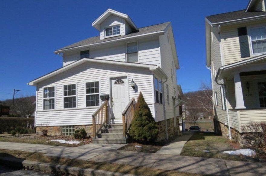 Very well kept home, located in walking distance to Fairview Park.  This home is freshly painted, with no finishing touches needed.  Walk in thru the sun room that is ceramic tiled and perfect for starting or ending you day.  The large living room has a gas fireplace with lots of natural light.  The dining room has new hardwood floors with access to the back covered deck for easy entertaining.  The kitchen has plenty of cupboard space, and is equipped with appliances.  Walk upstairs and there are three very large bedrooms, with a full bathroom and a huge walk up attic.  You also have the option of parking in a two car garage, driveway, or off street out front.  Schedule your private showing today.