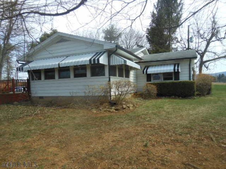 Nice lot. Experience country living. So many possibilities with 1 story living. 2 Car detached garage, public water and sewer.