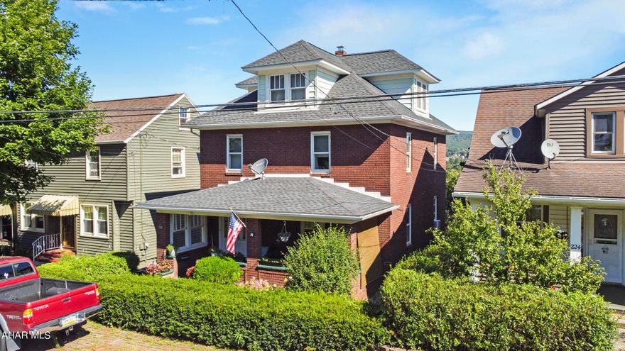 Welcome to 226 Burkhard Street in the Lower Yoder Township area of Johnstown. Located on a quiet street, this property has been meticulously maintained and features a brand new roof on both the house & garage. As you enter the main floor you will be greeted by the beautiful original woodworking from 1924. The main floor includes a large foyer, living area, formal dining room, & a large kitchen w/ another dining room that overlooks the city. The 2nd floor includes a large bathroom & 3 spacious bedrooms. The attic is unfinished but is HUGE & has so much potential. The basement is unfinished but has tile flooring, storage, & a half bath. The exterior features a covered front porch, detached garage, beautiful landscaping & so much more.