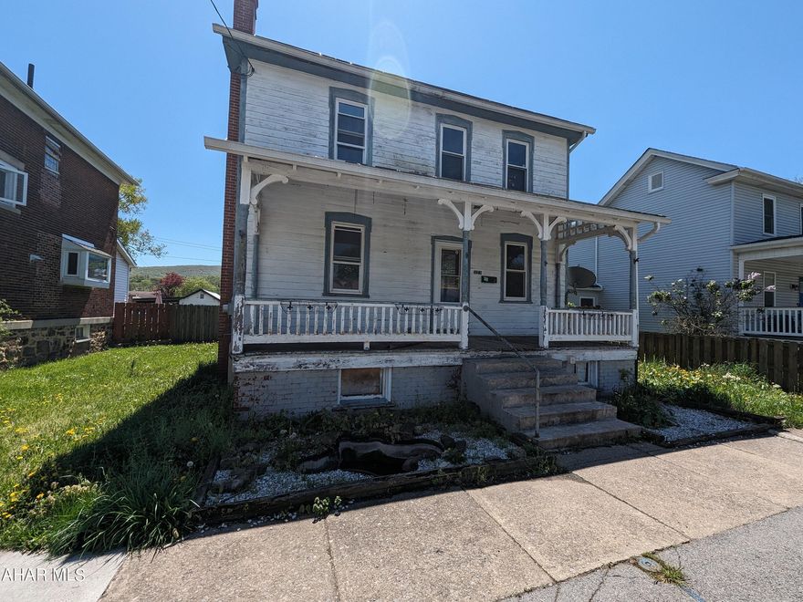 Hollidaysburg Borough 2 story home with character and charm. Just needs some TLC, but perfect for investors or handy persons. Features large entry foyer, living room, eat-in kitchen and half bath all on first floor. 3 bedrooms and 1 bath upstairs. Attic w/ pull down stairs for storage. Large rear deck and fenced lot plus 2 car garage and wood shed. AS-IS sale. Seller will make no repairs. BUYER PAYS BOTH TRANSFER TAXES AND DEED PREP.