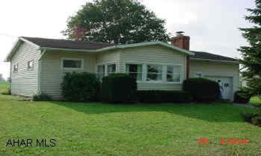 A small 2 bedroom rancher on a nice level lot.