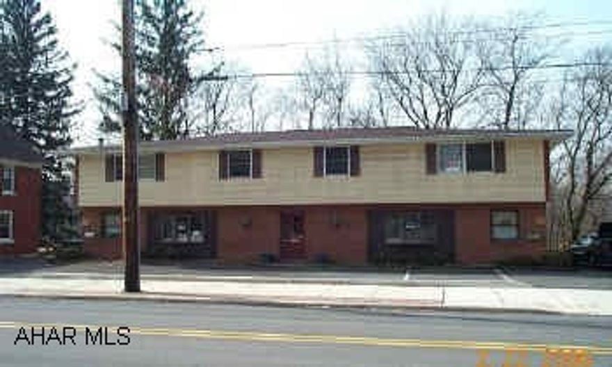 10 Parking Spaces - 4 Each Side - 2 in  Front (2) 1st Floor Offices - Front (1) 1008 sq ft - (2) Rear 740 sq ft w/2 2- 2BR apartments above - both apartments - electric heat - 1st floor - natural gas heat w/central air - 1st Floor Office Only!  Both apartments rented @ $425/ mo each.