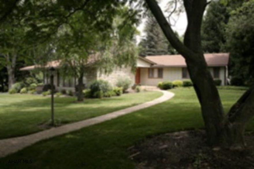 Location, Location, Location. Easy walking distance to schools, athletic fields, tennis courts, and downtown Bedford. Large double lot with 300ft frontage on cold water trout stream. One of a kind Frank Lloyd Wright inspired American Homes home of the year. Sunken living room with gas fireplace and beamed ceiling. Radiant floor heat with 4 zones. Skylights, cedar closets in all three bedrooms. Custom kitchen with stainless steel and granite counters. Granite faced fireplace. Custom cabinetry. Laundry room. Oversize spa tub with autofill system. Walk in shower with all glass panels. Two car garage with built in cabinets and work table. Storage shed. Large patio with fenced in back yard and waterfall. All with extensive landscaping including exotic trees. Must see!