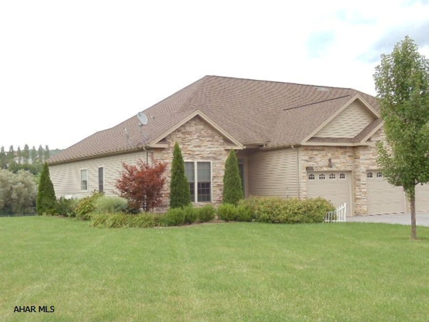 Beautiful Setting! Great view of the mountian. Immaculate 4 bedroom, 2 bath home with maple kitchen, walk in closet and jacuzzi tub in master bath, vaulted ceilings, ceramic tile floors, deck and retractable awning, and 2 car garage. Across from Scotch Valley Countryh Club.   J-197