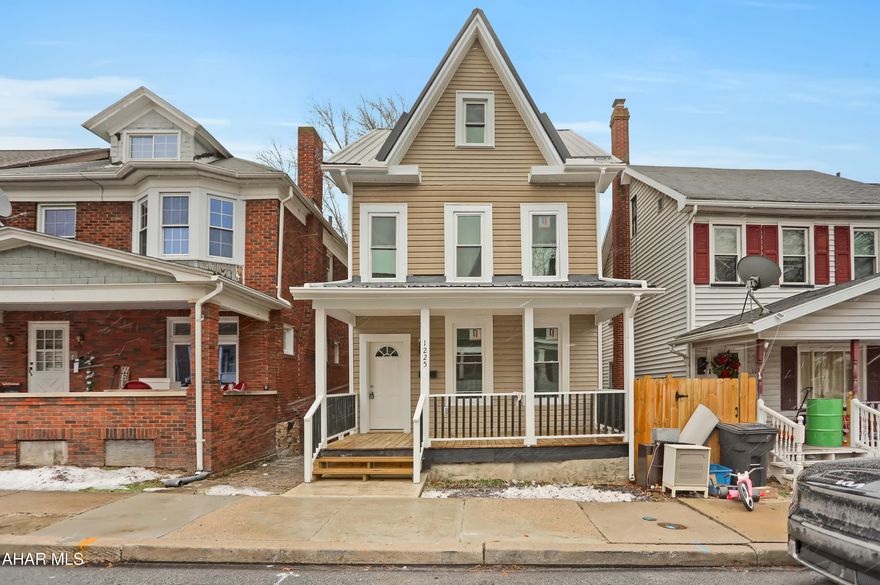 Completely remodeled home with oversized garage. Inviting living room with accent fireplace, first floor laundry, spacious bedrooms, and covered front porch.  New roof, windows, siding, electrical, plumbing, kitchen, bath, and flooring complete this home. Will meet any financing type (USDA Rural Housing, PHFA, VA, FHA, etc).