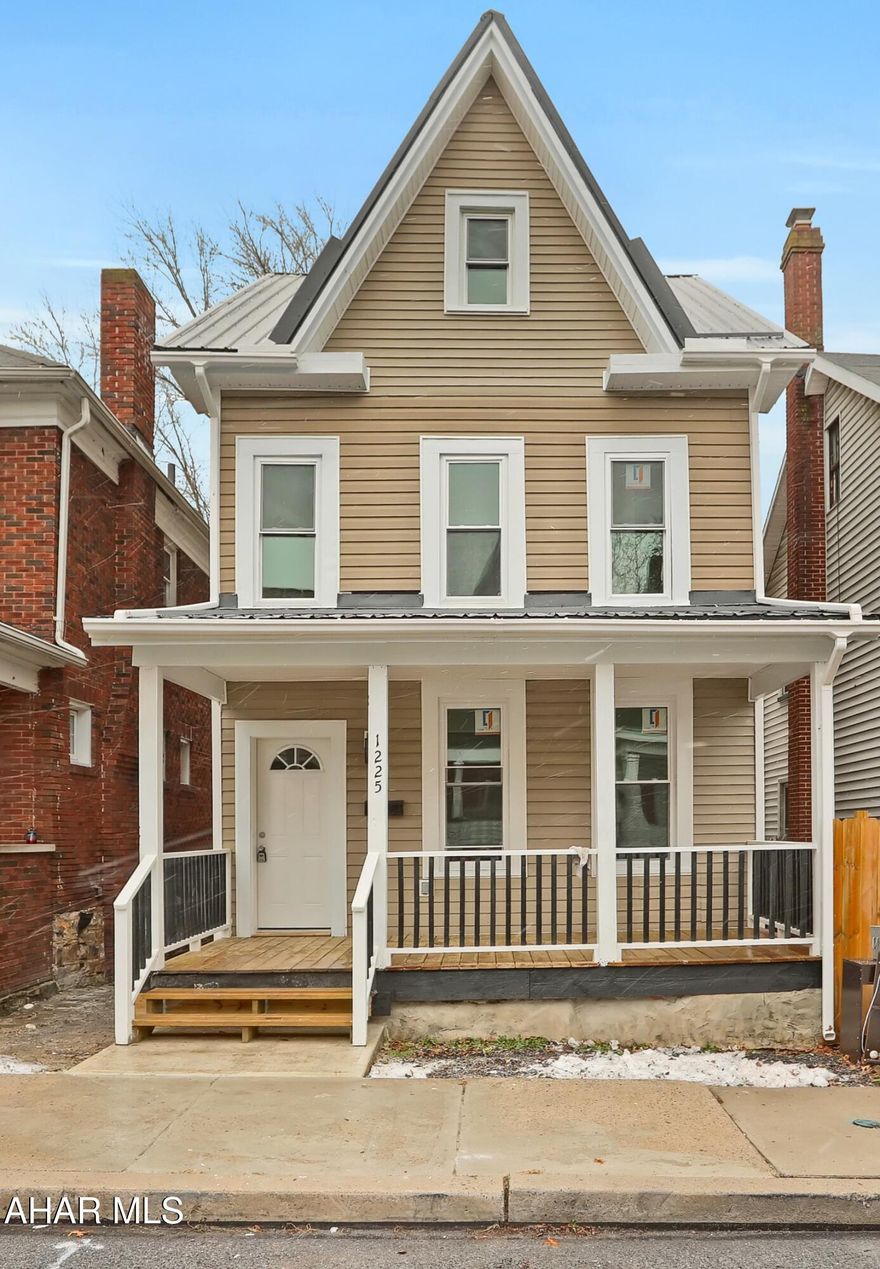 Completely remodeled home with oversized garage. Inviting living room with accent fireplace, first floor laundry, spacious bedrooms, and covered front porch.  New roof, windows, siding, electrical, plumbing, kitchen, bath, and flooring complete this home. Will meet any financing type (USDA Rural Housing, PHFA, VA, FHA, etc).