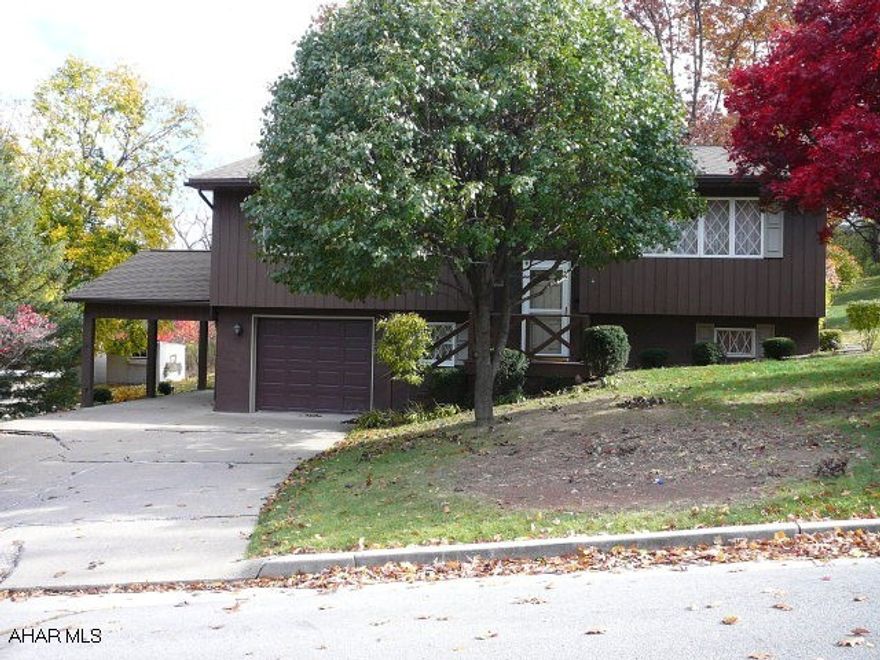 Well maintained bi-level on a large corner lot. First floor family rm with vaulted ceiling, skylights and decorative fireplace. Nice kitchen with breakfast bar. Lower family room with fireplace. Den could  be used as 3rd bedroom. Newer roof and central air. Nice size deck.