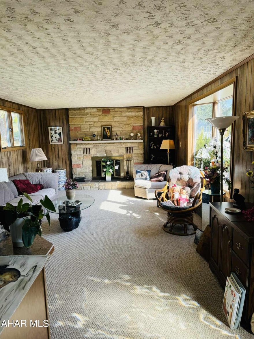 Gorgeous view of Lake Rowena right across the street.  This home is incredibly charming and cozy.  Enjoy the nice sized living room with a gas fireplace and beautiful bay window.   There is lots of natural light throughout the home.  Directly off the living room is a large kitchen with lots of counter space.  You will find 2 bedrooms.  Bedroom 1 has an original hardwood floor and built in cabinets.  Bedroom 2 features a big closet, hardwood floor, laundry chute that goes directly to the basement, and a 3/4 bath. Bonus family room off Kitchen that can be used to turn into a spacious dining room.  But wait, there's more! Another additional room with its own private entrance that would make for a great home office.  Full bath features a jacuzzi tub with real stone on the wall.  All rooms mentioned above are downstairs, so if you're looking for a home that's mainly one story, this home would suite your needs. 
Upstairs you will find a large open space with original hardwood floor, making this a great place for a 3rd bedroom, play room, or ''man cave''.  This home  is beautiful and you definitely want to see this stunning view for yourself!   Enjoy the perks of having an outdoor dog park, fishing, kayaking, and playground all within a short distance from your home. This home  won't last.  OPEN HOUSE: 3/17/24 from 4-5:30 pm.  See you there!!