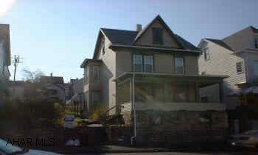 2.5 STORY HAS 3 BEDROOM, 1 BATH. LARGE LOT, NEW REPLACEMENT WINDOWS ON SECOND FLOOR.  THIS 3 BEDROOM HAS FIRST FLOOR LAUNDRY, NEW FURNACE, NEW SHINGLE ROOF, UPDATED WIRING. FINISHED HEATED ATTIC. FANTASTIC WOOD TRIMS WITH POCKET DOORS.