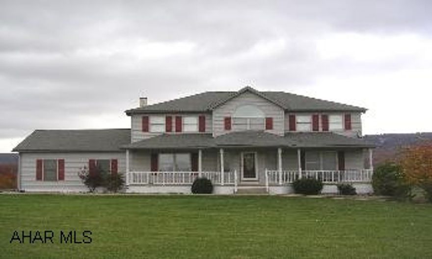 HOME SITS ON 7+ ACRES WITH A PANAROMIC VIEW.  OPEN FLOOR PLAN, LOVELY MASTER SUITE, SPACIOUS GREAT RM OFF KITCHEN PLUS LOWER FINISHED FAMILY ROOM.