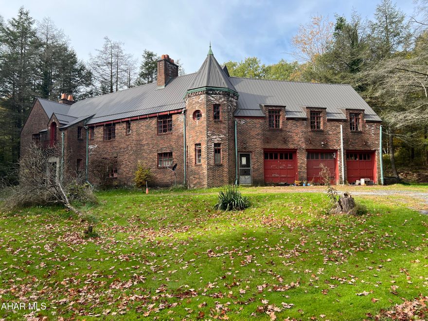 Cash offers only. Early 1900's historic mansion on approx 14 acres. Located in a private setting this brick mansion  includes a new roof and two car garage. Interior needs complete remodeling as it is not habitable in its current state.  Could be your chance to own a once in a lifetime property if financially able. GIS maps states property is 18 ac however there is approx 4 acres that has been reserved - field - not being sold.