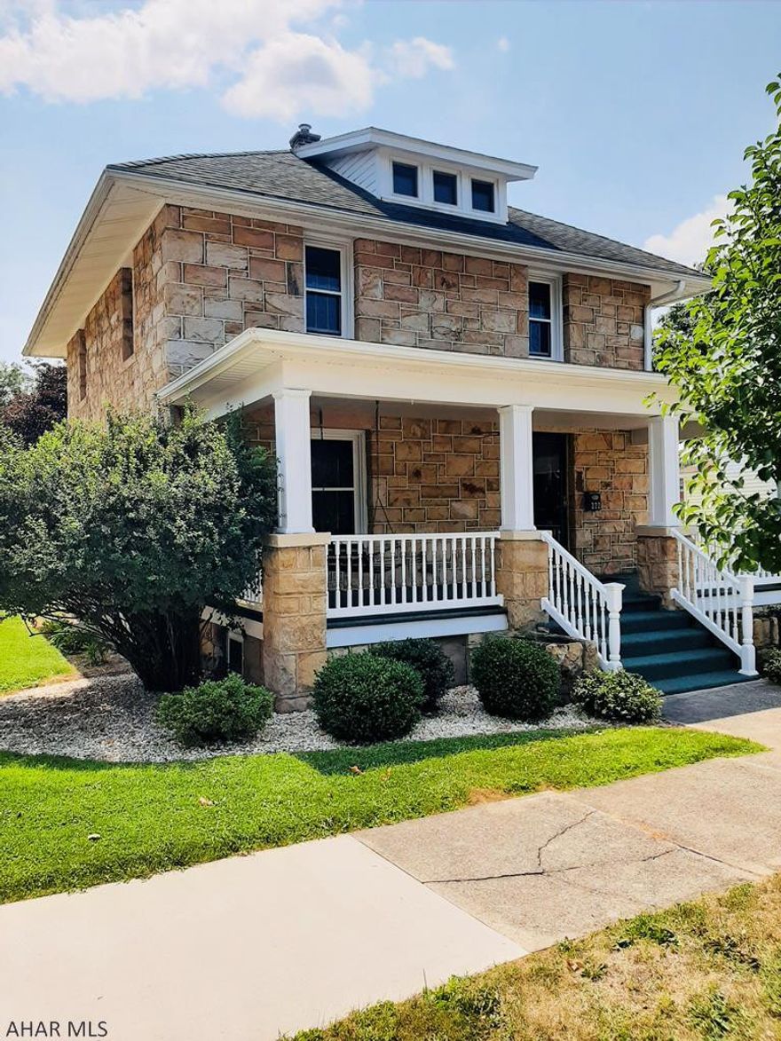 Welcome to this charming stone home with all the original character! This welcoming home features large foyer, hardwood floors, updated kitchen and baths and brand new carpet upstairs. Walk up attic with plenty of storage, plus a 24x 26- 2 car garage. A covered 10x25 front porch, perfect for those relaxing evenings. Call for your tour today!