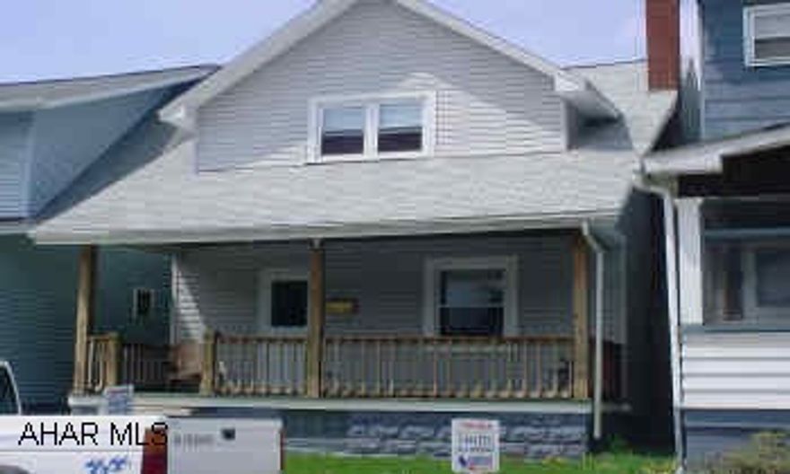 Nice 2 story  New siding, vinyl, thermo windows, roof, furnace, wiring, oak kitchen, bath and large rear deck.