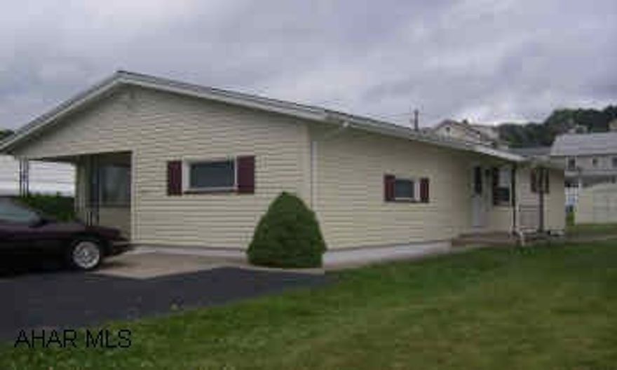 Vinyl siding, soffit and fascia, gutters and spouting 3 years old.  New oak kitchen cabinets and recessed lighting.  C/A.  1/2 Bath in basement.