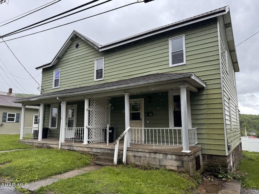 Each side has 3 BR's & Bath, LR, DR, & Kitchen.  Live in one side and rent the other side to help with the mortgage payment OR have a 2 unit great investment property.