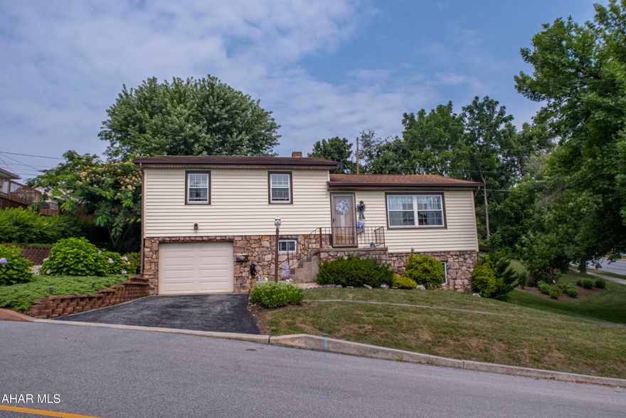 Well maintained three-bedroom home located on a spacious corner lot, offering plenty of outdoor space and curb appeal. Upon entering, you're greeted by a large living room, which flows seamlessly into a separate family room, providing ample space for both formal gatherings and casual relaxation. An additional bonus room offers the flexibility to be used as a home office, playroom, or gym.

The home features durable and stylish hardwood and tile flooring throughout.The kitchen and bedrooms are well-proportioned, and the home includes one and a half baths.

Step outside to discover a large patio, perfect for outdoor dining, entertaining, or simply enjoying a quiet moment. The property also includes an integral garage, providing secure parking and additional storage, and a private driveway The entire property is meticulously maintained and truly immaculate, ready for you to move in and enjoy. Schedule a tour. Open House on Sunday, November 9th from 12:30-2:00.