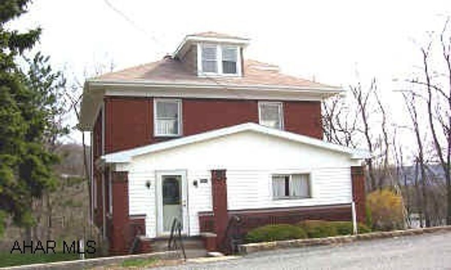 Large brick home in quiet neighborhood on a dead-end street with great views. Logan Township. 4 bedrooms, separate dining room, and enclosed porch. Home could use some updating, no off-street parking but there is room on either side of the house to cut in own private drive. PRICE CHANGE IS DUE TO INSTALLATION OF BRAND NEW SEWER PROJECT THROUGH LOGAN TOWNSHIP, SCHEDULED TO BEGIN IN MAY.
