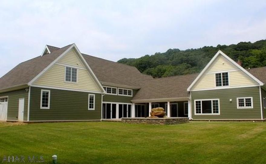 Opportunity Awaits! Upon entering this meticulously maintained home you will find two impeccably designed kitchens, 4 bedrooms, including a master suite on the main level. This home distinctively features a Jetted Swim Spa from PDC Spa's in a spacious room featuring redwood finishes, hot tub whirlpool, aromatherapy steam spa with shower, and Dectron Dehumidification Unit for spa area.. This one of a kind spa room is constructed with outdoor grade decking and Dryvit to resist moisture and is also complete with a 1/2 bath and kitchenette area.