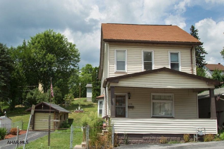 If you are looking for a home with large rooms, lots of space, off street parking, a garage, and low taxes, look no further.  This home is only moments away from local attractions and travel.  The garage provides convenient vehicle storage and the driveway allows for additional off street parking.  A large and covered front porch allows you to sit in the shade and enjoy the beautiful days.  The kitchen is large enough that you could use it as an eat in kitchen and use the dining room for a game or recreation room.  With your finishing touches this property will provide you with enjoyment for years to come.  Call the listing agent for your private showing today!  2017 Estimated Taxes are $749 with an assessed value of $52,000