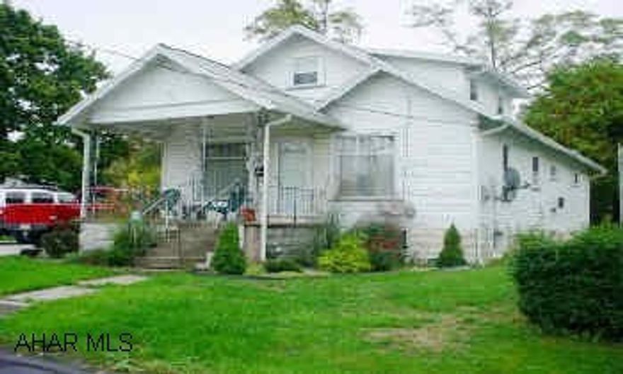 Large kitchen with ceramic floor. New windows, new furnace, hardwood floor in master bedroom. Realtor Owned.
