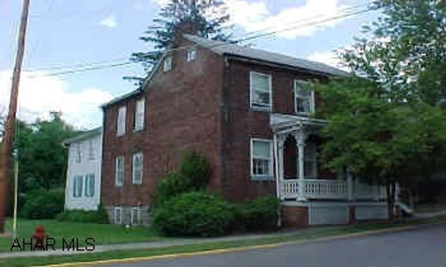 Charming historical older home on nice corner lot. Good in town location.