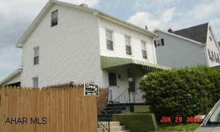 Double fenced lot, off street parking.