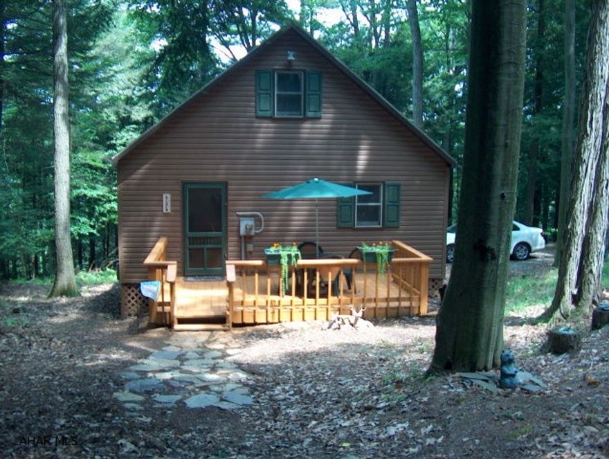 Gorgeous cabin- would make a great get-away or starter home.