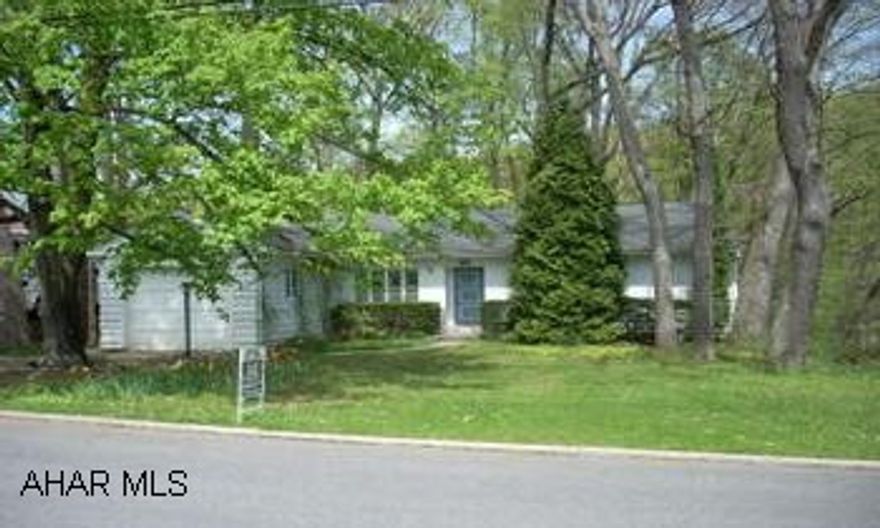 Affordable 3 bedroom, 1.5 bath rancher in Tyrone's Hillcrest neighborhood.  Home features hardwood floors, wood fireplace, stone patio, and overlooks a huge wooded lot. Affordable 3 bedroom, 1.5 bath rancher in Tyrone's Hillcrest neighborhood.  Home features hardwood floors, wood fireplace, stone patio, and overlooks a huge wooded lot.