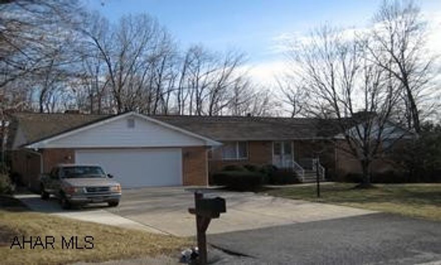 Beautiful ranch home with lovely cherry kitchen expanding into family room with gas fireplace. Master bedroom with new master bath. Large family in basement with fireplace. Four season sunroom.