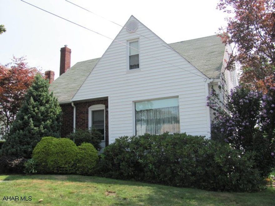 Ebensburg- Beautiful 3 BR, 1  bath Cape Cod home on a 60 x 146 lot with a 1 car integral garage, eat-in kitchen, built in cabinets, wood stove & whirlpool tub in bath.