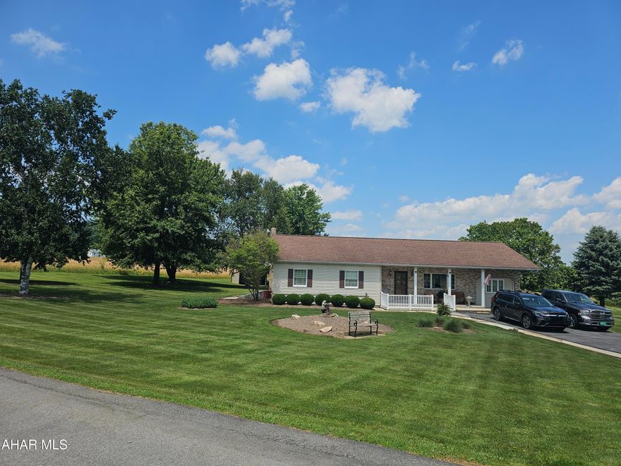 Talk about possibilities in the Cove!! This home sits on 2.68 acres with part of Clover Creek at the far side of the property that actually runs through the property giving you a water source for farm animals if you wish or fishing with the family. The home has been meticulously cared for by the sellers, they built the home and have done so many upgrades throughout. There is a large RV pavilion in the back to store all of your outdoor equipment with electric. There is also a large workshop to tinker around in or use for storage. Fruit trees and a grape arbor are there for your enjoyment!!!  
When you walk in the front door you feel totally at home, with an eat in kitchen with plenty of cabinets. The family room in the basement is the perfect hang out spot, especially in the winter with the wood burning stove for those chilly nights., 
There is a beautiful back porch to sit and have your morning coffee and watch the wildlife pass by, call me today for your tour of this little piece of paradise.