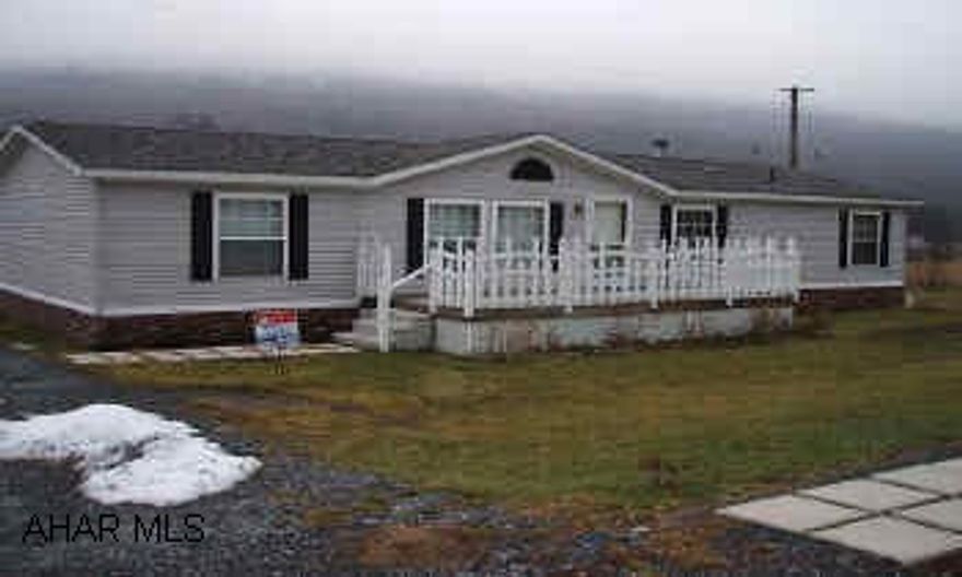 Beautiful doublewide on private .25 acre lot. Move right in.  Features large Master Bedroom with awesome Master Bath.  Family Room with Fireplace.  Lots of Closet Space.  Great kitchen.