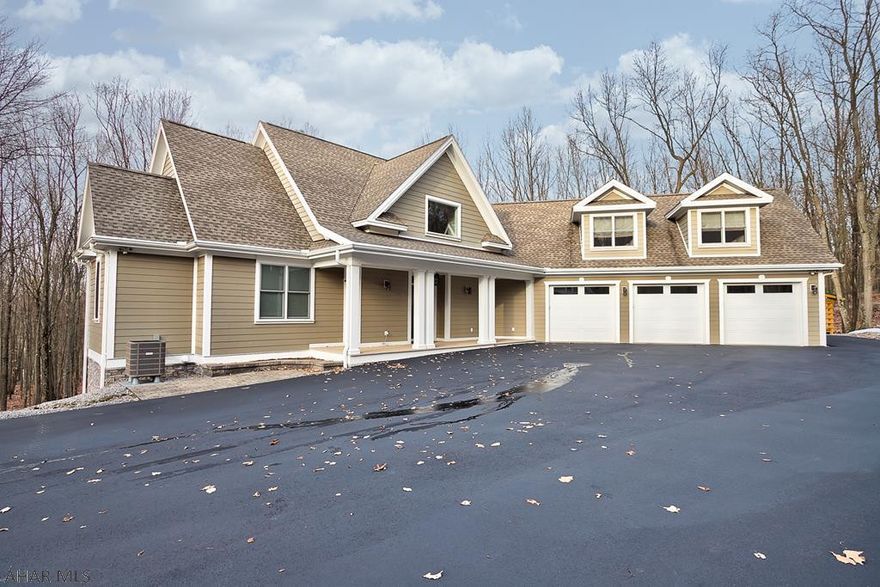 18 miles to Wegmans-Meticulously built custom designed home on 10.3 private acres. Every Amenity is offered in this 5 bed, 4  bath 4450 sq. ft. Craftsman style home. Open floor plan w/ dramatic 2-story entry; Great room w/ post & beam style, floor to ceiling stone fireplace, cherry HW floors & access to 1 of the 2 screened in porches; Chefs kitchen w/ GE Monogram appliances, granite counters, duel ovens, custom cabinets, huge center island & a cozy den; Bright dining room;1st floor owners suite w/bedroom, walk-in closet & full bath. 2nd Floor- 2 full baths & 3 big bedrooms w/ custom built-ins(1 bedroom is 15' x 44' w/ endless usage possibilities). Entertainment made easy in the w/o lower level- w/ kitchen, billiards room, family room,office,5th bedroom, full bath & stone wine cellar.