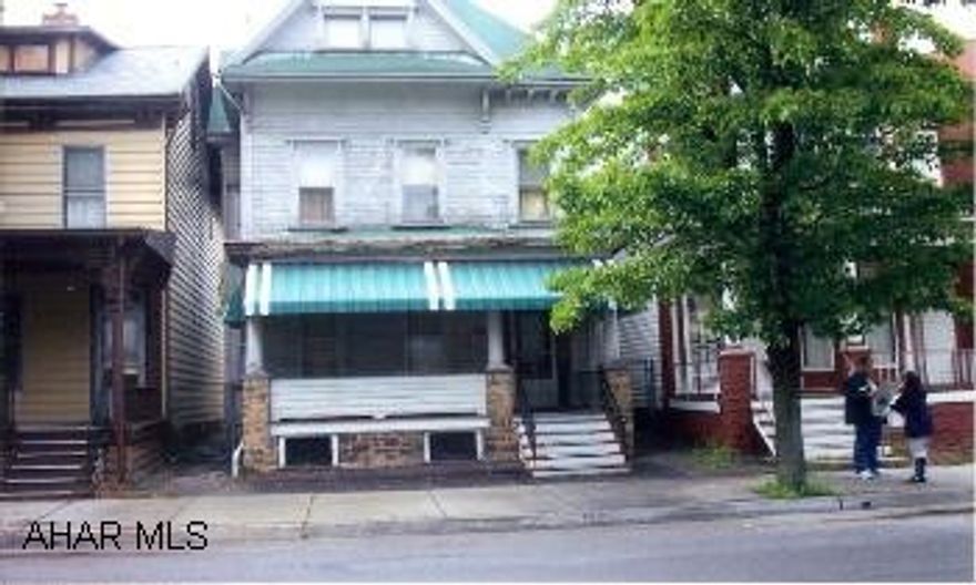 Large 2.5 Story frame with large rooms, 11 total rooms, single pane windows, natural woodwork, victorian bathroom, finished heated attic, brick 2-car garage on a 25x133 lot.  Needs work. Large 2.5 Story frame with large rooms, 11 total rooms, single pane windows, natural woodwork, victorian bathroom, finished heated attic, brick 2-car garage on a 25x133 lot.  Needs work.
