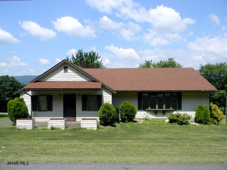 Nice vinyl ranch, 2 BR/ 1 BA on half acre within extended Western view. Very large living room and master bedroom. Formal dining room, full basement w/ large recreation room, 2-car integral garage. This home is priced to sell!