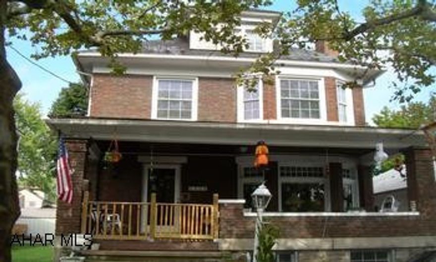 3 Story Brick Great Solid Brick home, with 4/5 Bedrooms.  Natural Wood work, Treyed ceilings and folding Beveled Glass doors to a DR.  Wood burning fireplace and a detached garage.