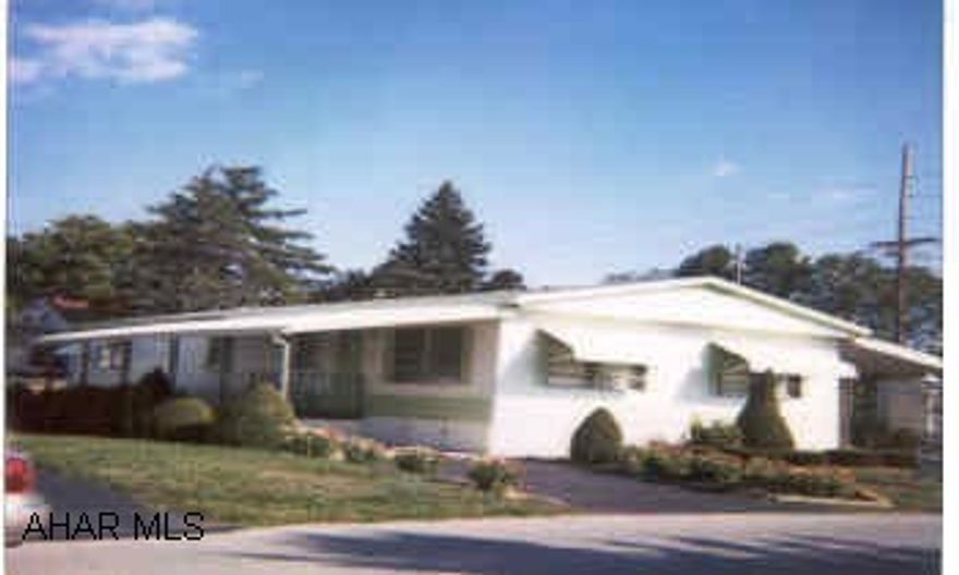 Double wide - 3 BD, 1 1/2 BA.  Ceiling fans in all rooms.  All appliances stay.  Storage under crawl space.  Two covered car ports - restricted 55 or older residents.  City sewer / water $82.00 for 3/mo.  $245 lot rent, includes garbage.