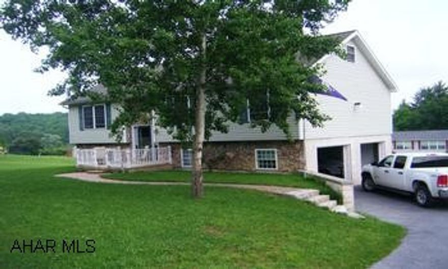 Bilevel home, built 2002. Modular construction. Sunroom added to rear 2007. Excellent condition. Paved driveway, 10x14 shed, pellet stove in family room, water conditioner owned, new carpeting main level, attic flooring with indoor outdoor carpeting and loads of storage area, paddle fans(4) newer deck, alarm system.First time homebuyer tax credit, up to $8,000.