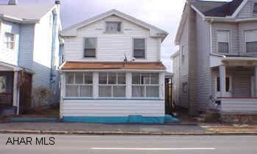 Adorable 3 bedroom home with sunporch, covered patio, and 1 car garage. Very well maintained with lots of storage space. Electric updated '00, water heater replaced '05, water main replaced '93, roof replaced '94, windows replaced '94-'01. All newer carpet. Must see inside!