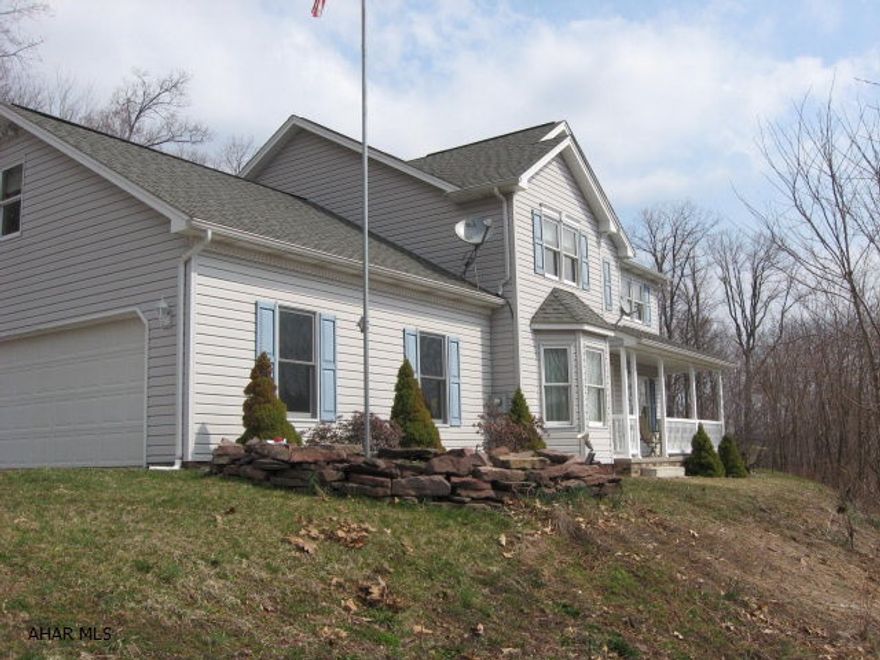 Spacious 4 Bedroom, 3.5 Bath home on  1+Acres with a great view.  Private wooded setting.  Lower level finished with full bathroom.  4 Zone GFA heat.  PH neutralizer system -filters out sediment.  lease $68 every 3 months