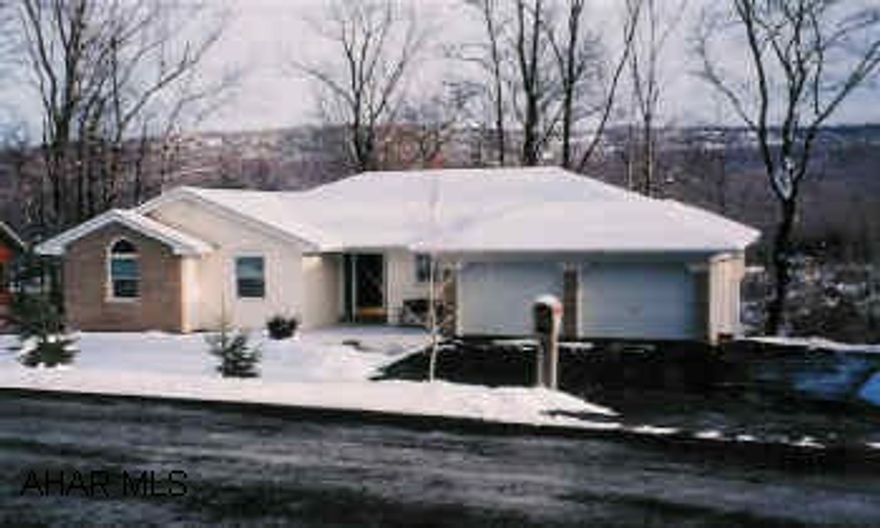 Gracious elegance and space aplenty in this 3BR/2BA home in prestigious neighborhood. Modern kitchen with work island. Two rear decks. Basement plumbed for additional bath.