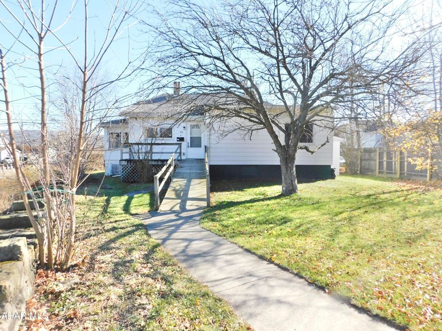Welcome to the sweetest one story home in Toy Town.  The living room features plenty of natural light and original hardwood floors.   The sizeable master flows into the first floor laundry.  If needed, this room could be converted back into a 3rd bedroom.  The bathroom features a walk in shower as well!  Enjoy sitting in your sunroom and listen to the wall flowing through the rocks of the Mill Run stream.
This property has off street parking as well as a garage to keep your vehicle snow free in the upcoming months.  Complete with a front door ramp, this property checks all the boxes for complete one story living.
Call today for your private tour.