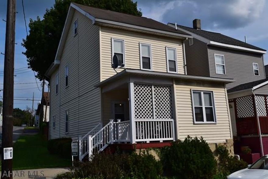 Spacious 3 bedroom home, with a walk up attic situated on a large lot. This is a perfect starter home or investment property. Walking distance to the library, schools and much more.